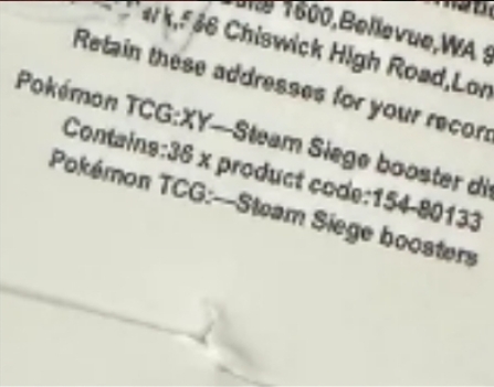 Close-up of sealed clear plastic wrap fine print displaying Pokémon TCG XY Steam Siege booster box text